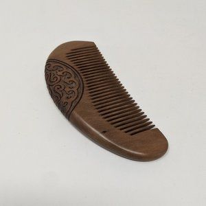 Handmade peach wood carved comb